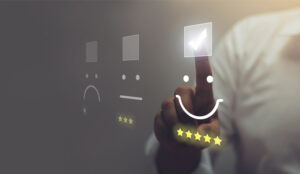 A picture of a person selecting a star rating on a touch screen
