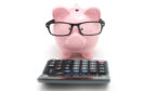 A picture of a piggy-bank and a calculator-760