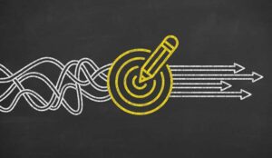 A picture of a blackboard with a target and arrows