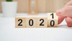 A picture of wooden cubes with numbers 2020 and 2021