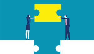 A picture of business partnership connected by a puzzle piece