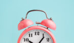 A picture of a pink alarm clock