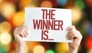 A picture of the words The Winner Is