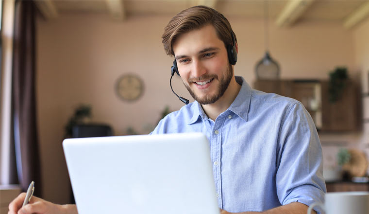 A picture of an agent working in home office