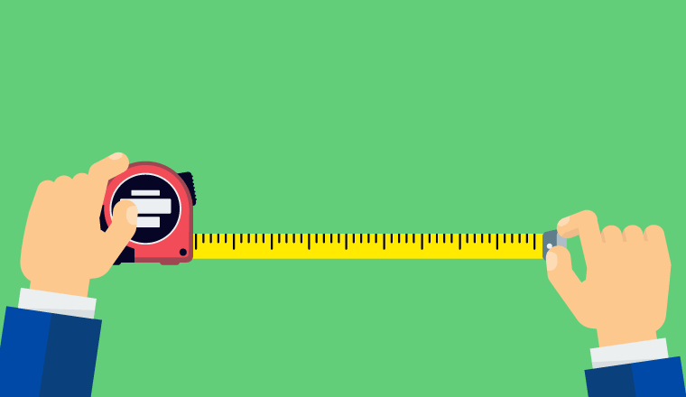 A picture of someone holding measuring tape