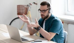 A picture of a remote worker sat at desk