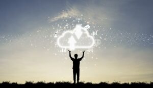 A photo of a man holding up a cloud