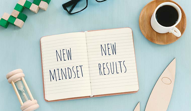 A photo of a "new mindset, new results" book