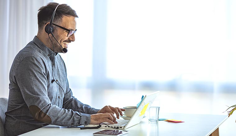 A photo of a remote call centre worker