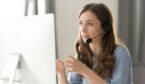 A picture of a call centre agent wearing a headset