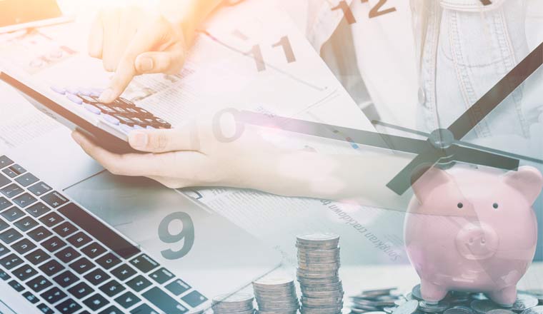 A picture of a laptop and calculator overlaid with a clock and piggy bank