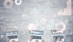 Top view of businesspeople sitting at table and using gadgets