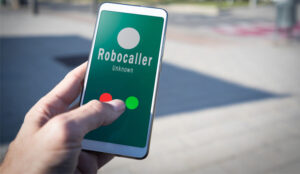 Smartphone showing a call from a robocaller on screen