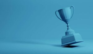 blue trophy cup on a blue background