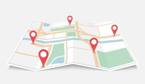 Folded paper city map with red pin pointer, vector illustration