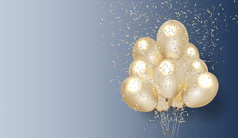 Gold balloons and confetti on blue background