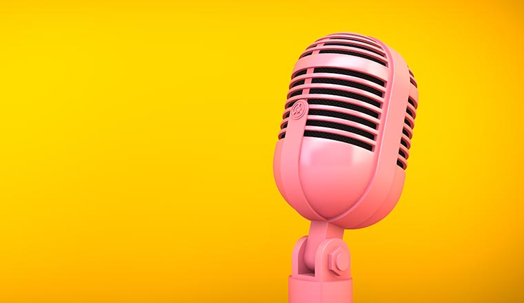 pink microphone on yellow background