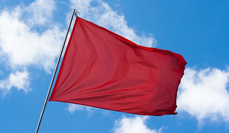 A reg flag on a blue sky background