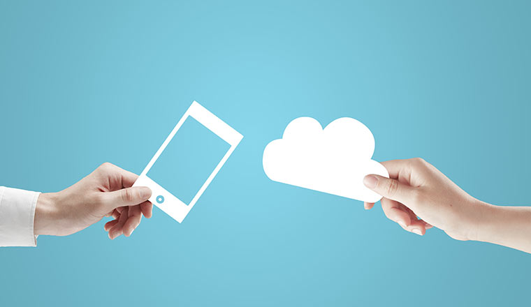 Two hands holding a phone and cloud cutout on a blue background