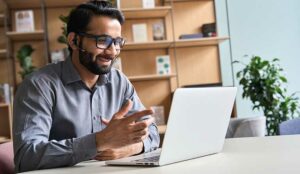 Person working from home wearing a headset