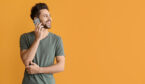 Person talking on mobile phone on color background