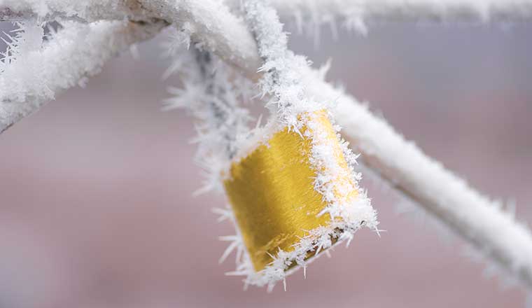 Ice padlock in winter - winter is coming and security