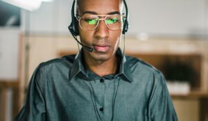 Call center operator talking with client