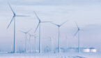 Windmills in a white winter landscape