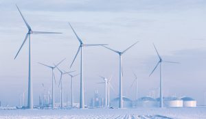 Windmills in a white winter landscape