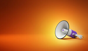 3d illustration of purple megaphone in an orange background