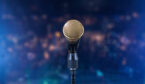 Golden microphone on stage