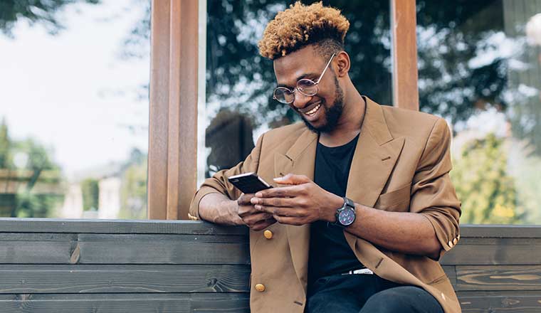 Person using phone to self serve