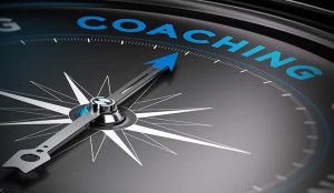 Compass pointing to coaching