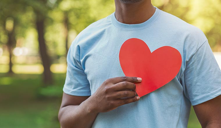 Person holding heart