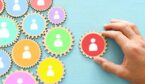 A human resources and management concept with people icons on cogs