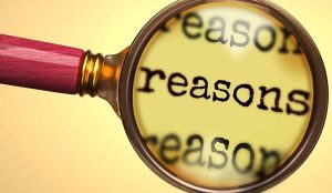 a magnify glass and word reasons