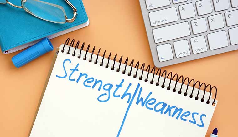 Strength and weakness list in the notepad.