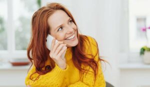 Happy person talking on phone