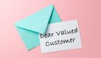 Green envelope and dear valued customer letter