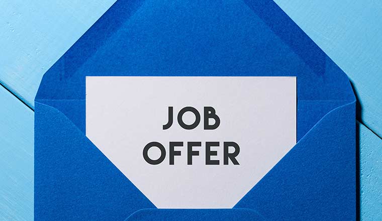 Job offer in blue envelope