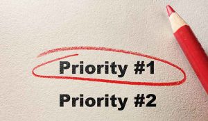 Top priority circled with pencil
