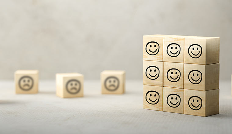 9 cubes with happy emoticons