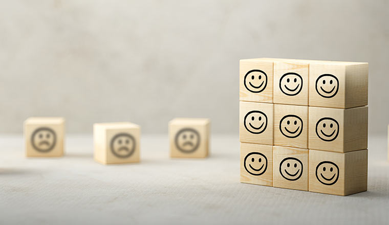9 cubes with happy emoticons