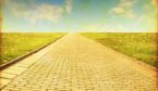 stone pathway leading to clouds