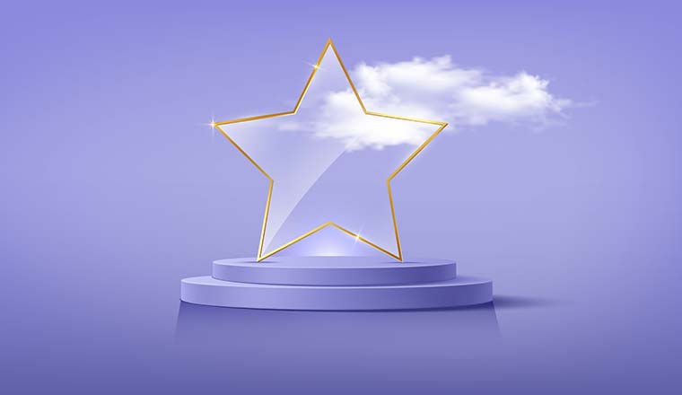A glass trophy award with gold star frame and a cloud