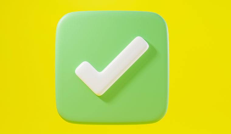 Green tick on yellow background