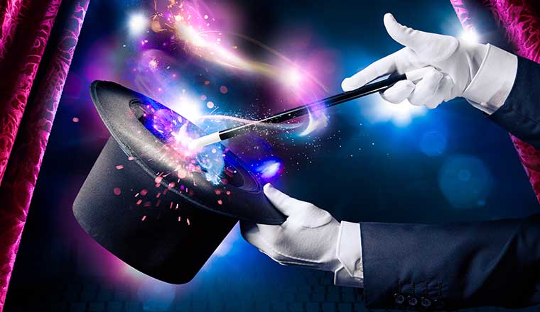 A magician hand with magic wand