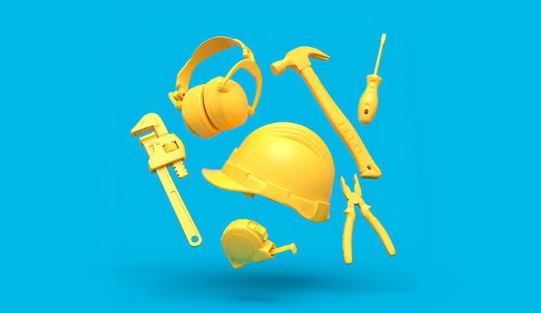 Flying view of yellow construction tools