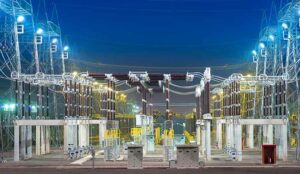 View of an electric substation at night