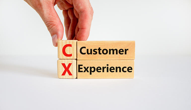 CX customer experience symbol. Concept words 'CX customer experience' on wooden blocks